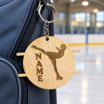 Figure skating keychain, standing-split pose, by the rink
